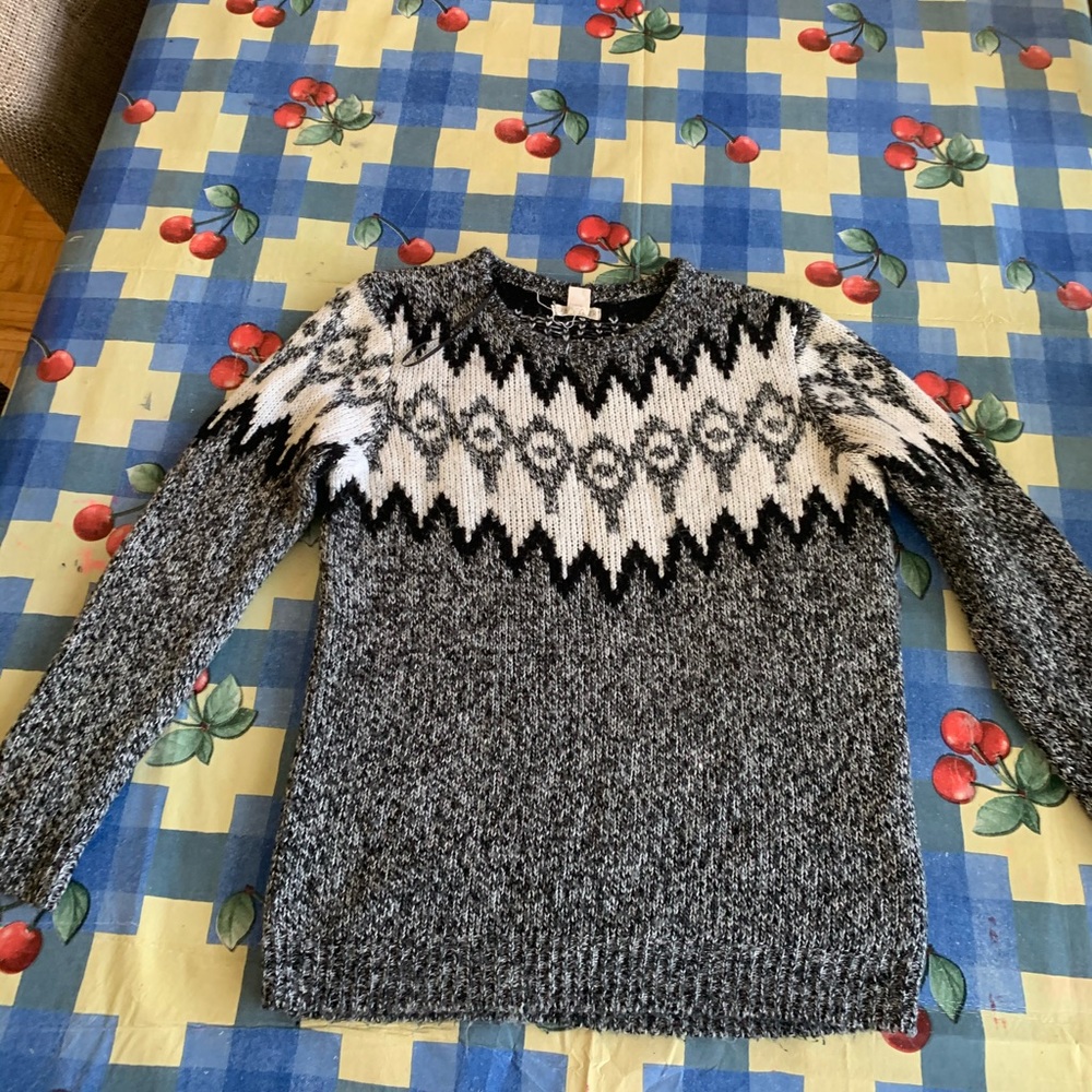 A grey women’s sweater